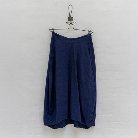 H+ HANNOH WESSEL blue Jocelyne midi skirt shown on hanger against white backdrop