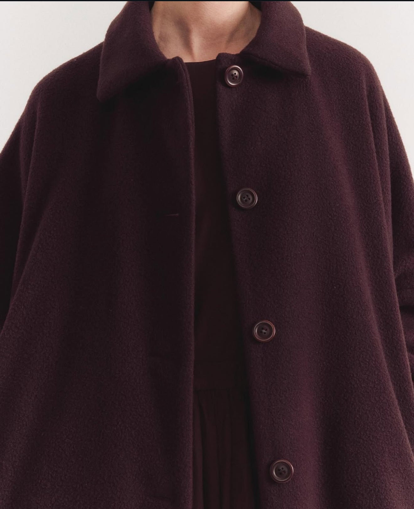Close-up on front and buttons of Casey Casey Big Blobby Coat in brown cashmere
