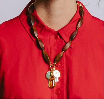 Model in red button-down wears Lizzie Fortunato Marilla necklace