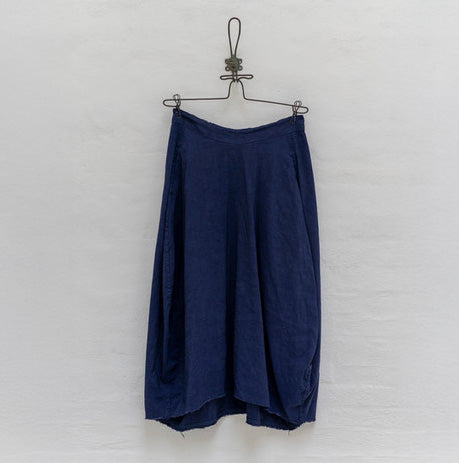 H+ HANNOH WESSEL blue Jocelyne midi skirt shown on hanger against white backdrop