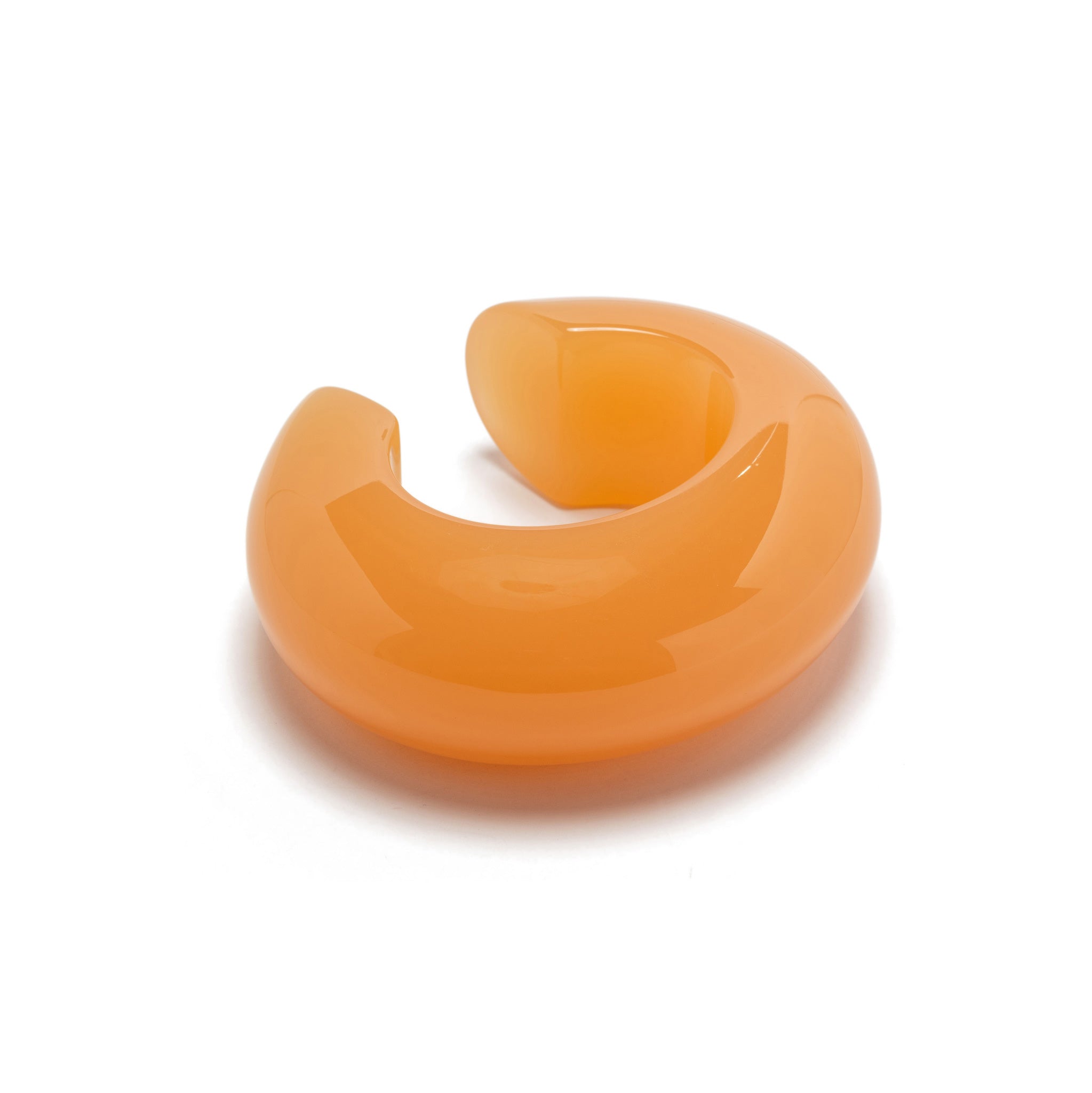 Lizzie Fortunato Arc Cuff in Apricot. Chunky resin bracelet in orange