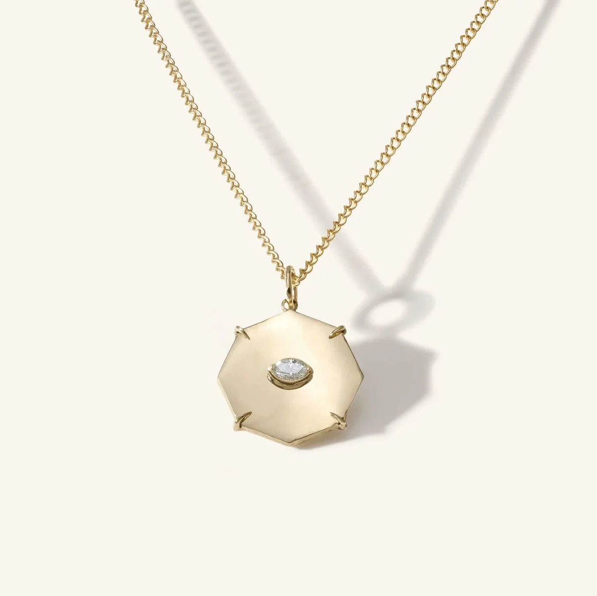 Zahava Mini Shiny Bliss Octagon, a gold octagon with 'eye' shaped diamond, on gold chain