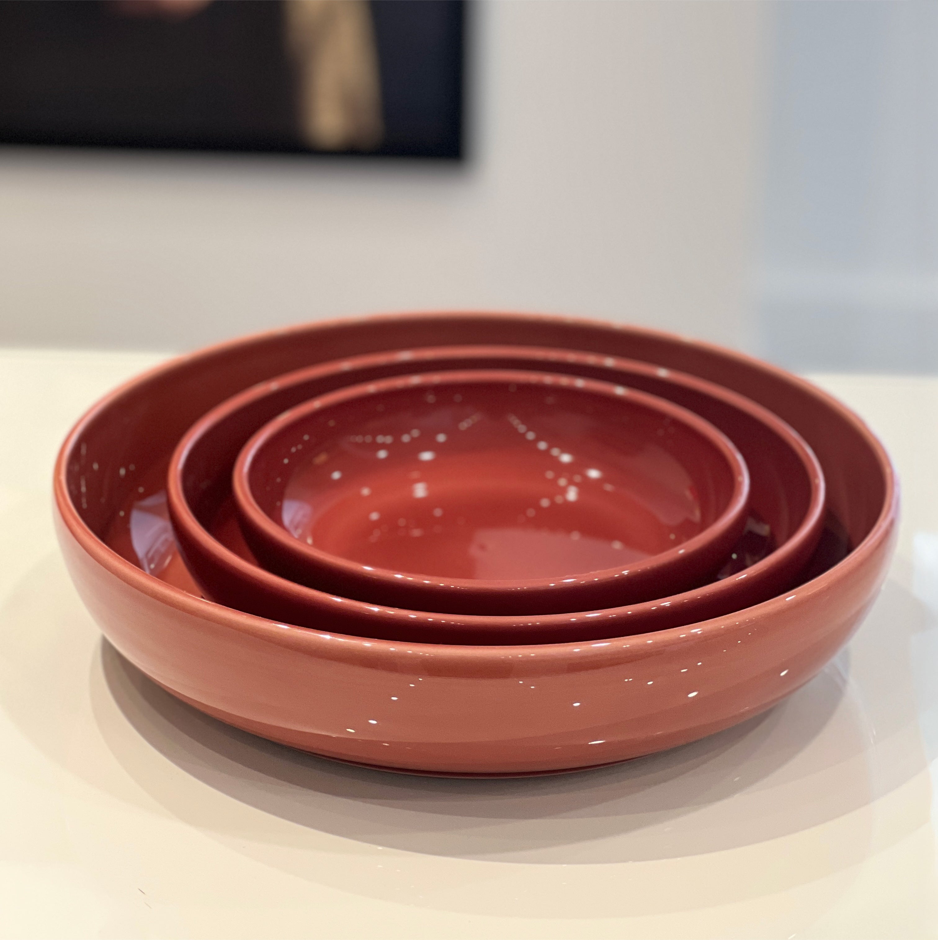 R+D.LAB Bilancia Medium Flat Bowl, set of three nested red ceramic bowls