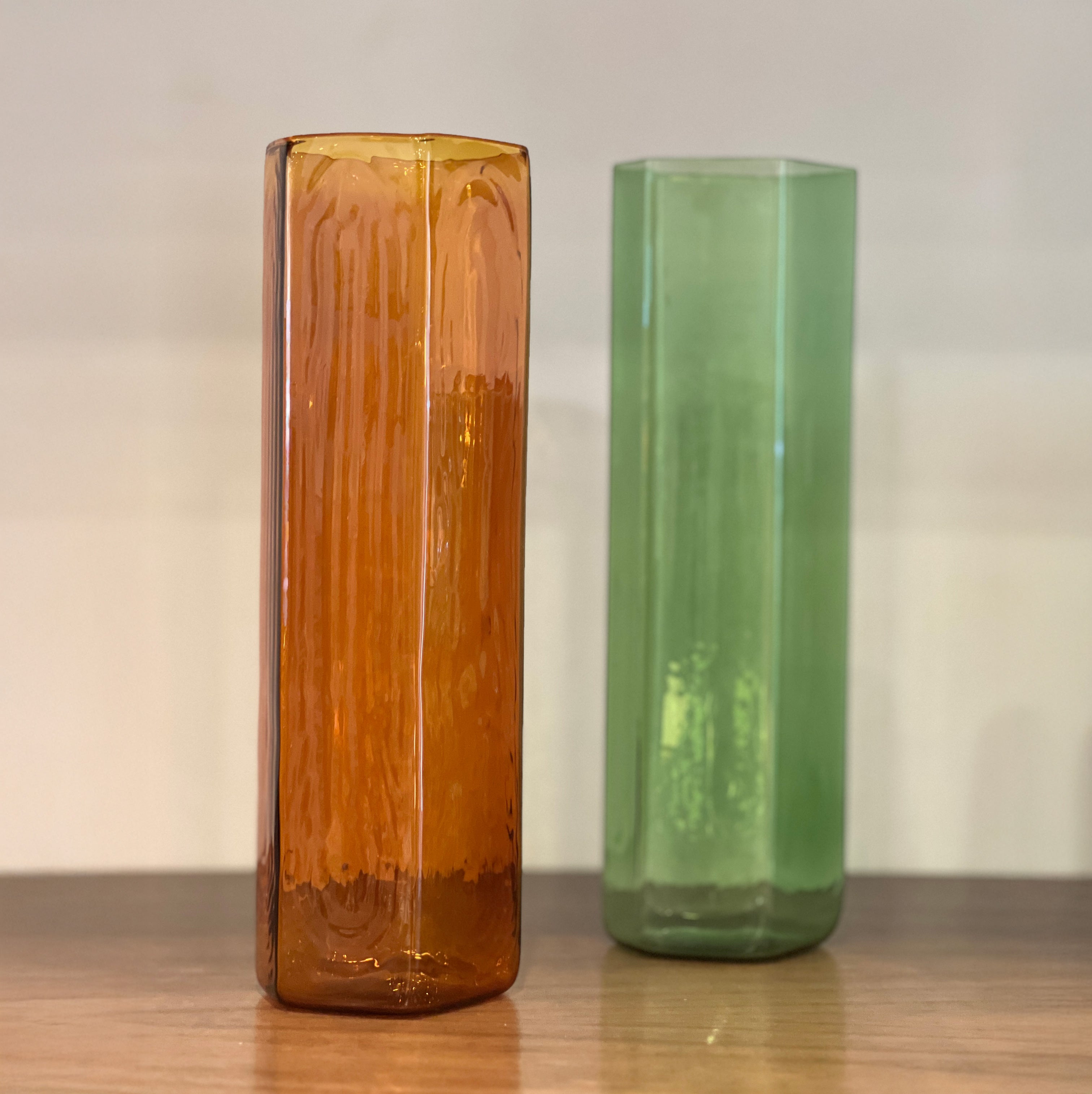 R+D.LAB Sonia Vaso, orange and green tall glass vases on wooden shelf
