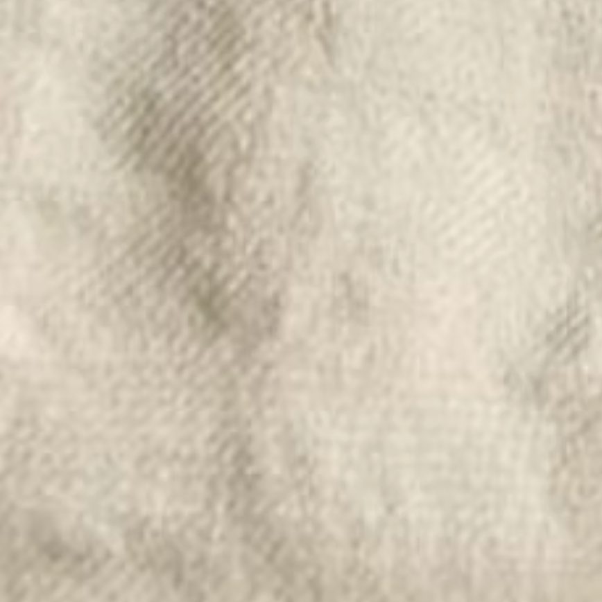 close-up of white textured fabric on Manfreda Coat